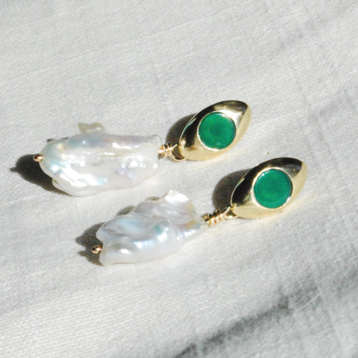 Bronze oval posts with green chrysoprase stones and a baroque pearl
