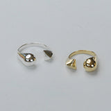 Split shank rings in silver and bronze with geometric details