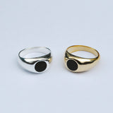 A collection of two Bubble Inlay Rings in silver and bronze with black onyx inlay designs