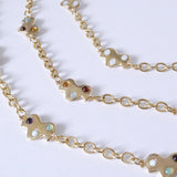Gold colored confetti cloud necklaces on a white background in 3 different color options