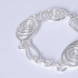 Spiral bracelet in sterling silver with a hook clasp