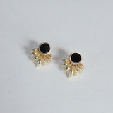 Bronze ray shaped earrings with black onyx inlay