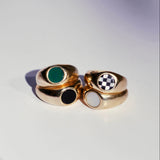 Four bubble inlay rings stacked, all bronze with four different stone options