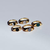 Five eye signet rings in bronze with different stone options in the center