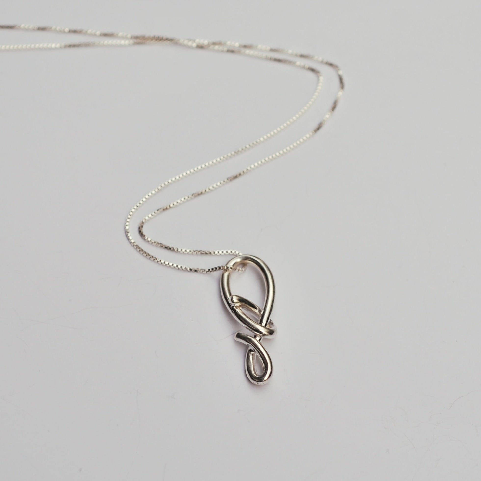 Charm Knot Necklace