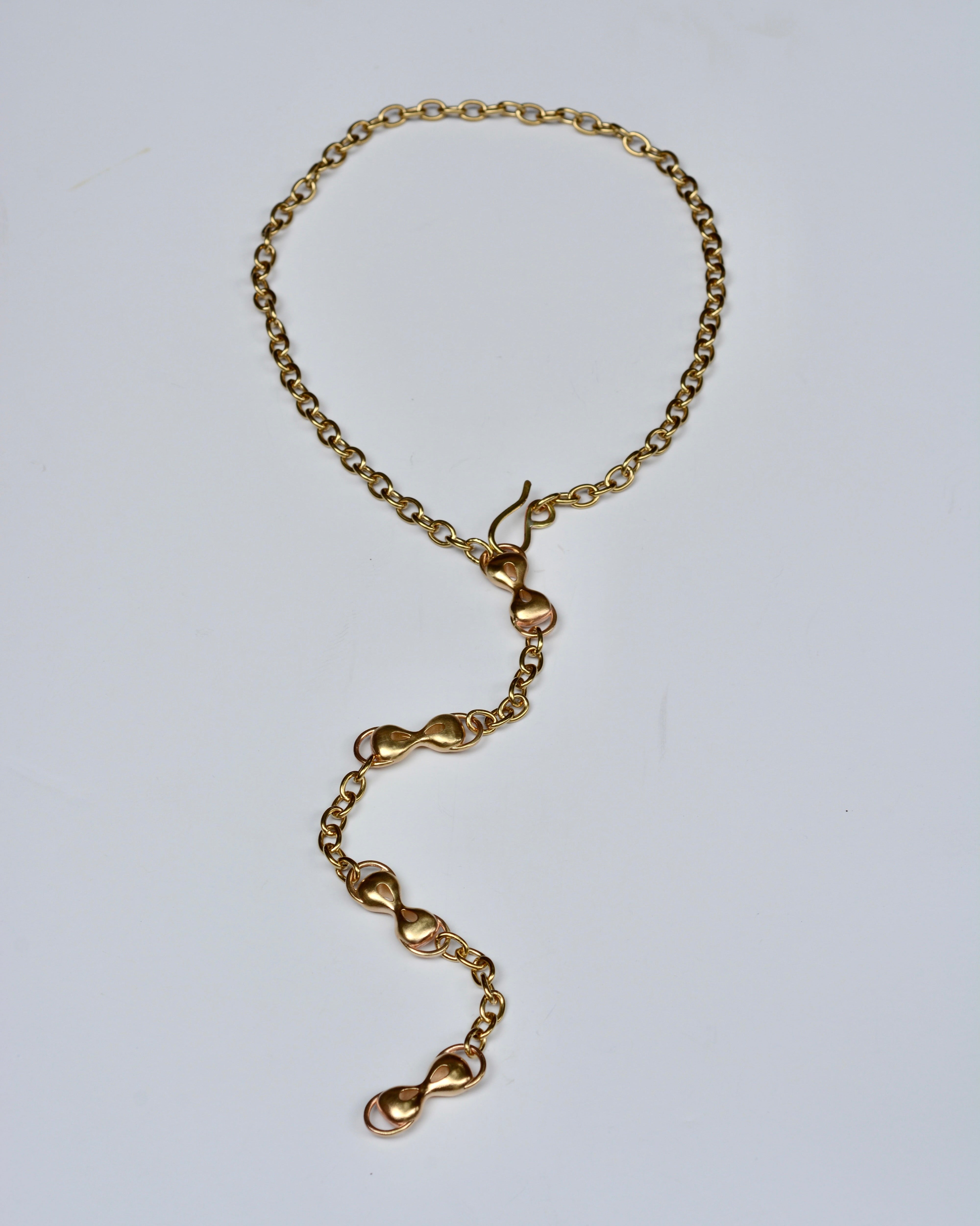 Bronze chain necklace on a white background
