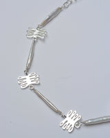 Sterling silver and pearl necklace with coral shaped pendants and long organic pearls
