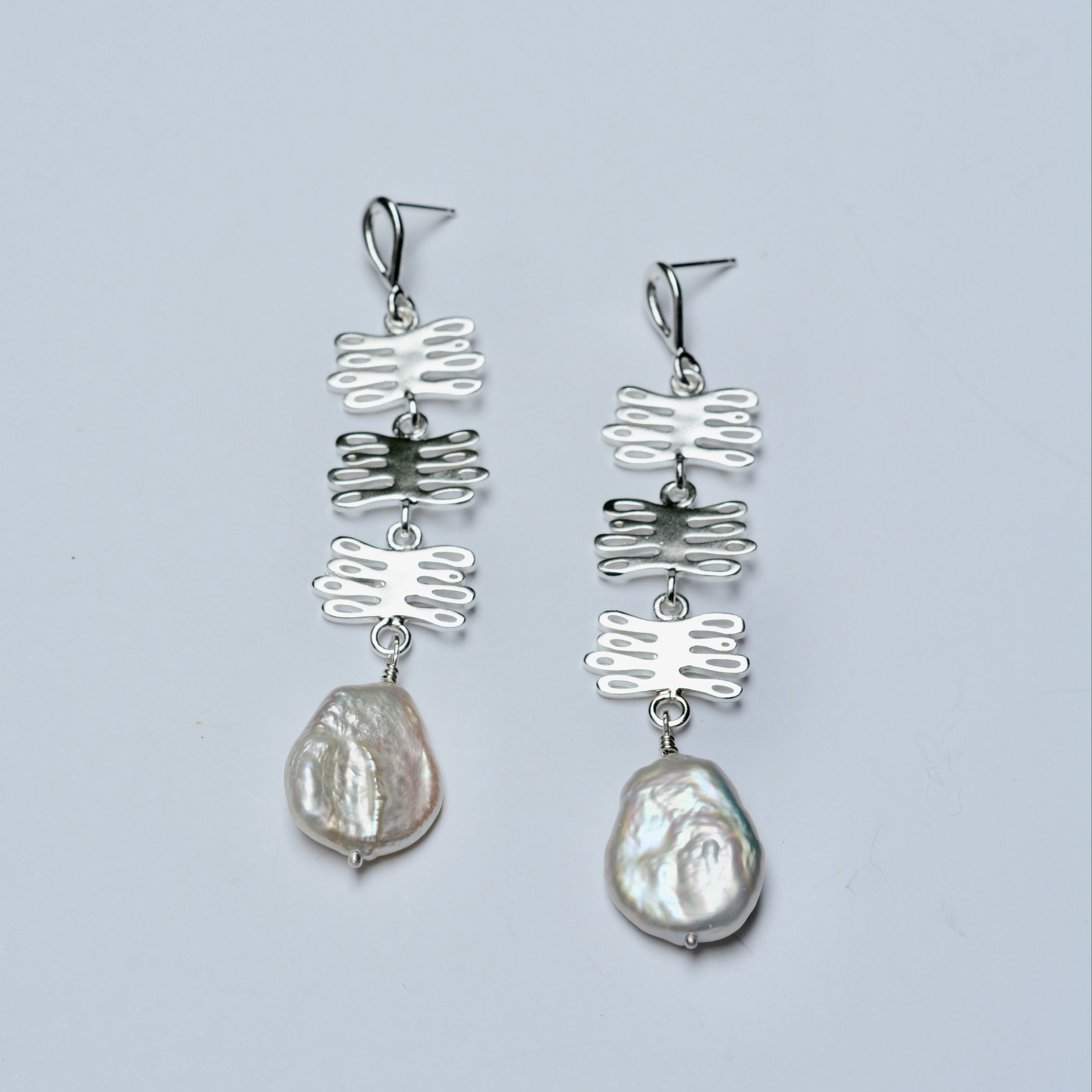 Sterling silver dangle earrings with kelp shaped charms and organic pearls