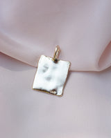 Back of a rectangular pendant with 14k stamp