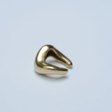 Back view of a wavy ear cuff in bronze